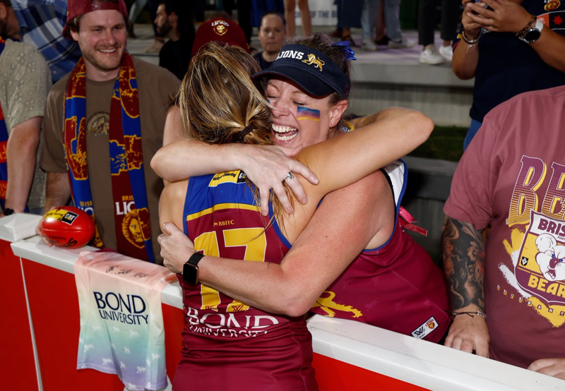 Happy fans at an AFL game
